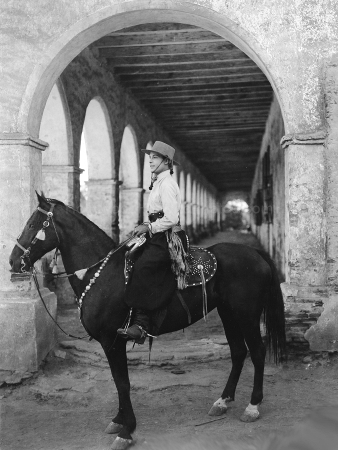 San Fernando Mission 1921 Rudolph Valentino on location for The Four Horsemen of the Apocalypse WM.jpg
